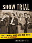 At the center of the cover is an uncolored photograph (which spans the width of the cover, but not the height) of 8 people standing in front of the Capitol building, under the title "Show Trial." Beneath the picture is a strip of yellow, against which the subtitle "Hollywood, HUAC, and the Birth of the Blacklist" is written in block lettering. Below this is another strip of black on which the author's name is written.