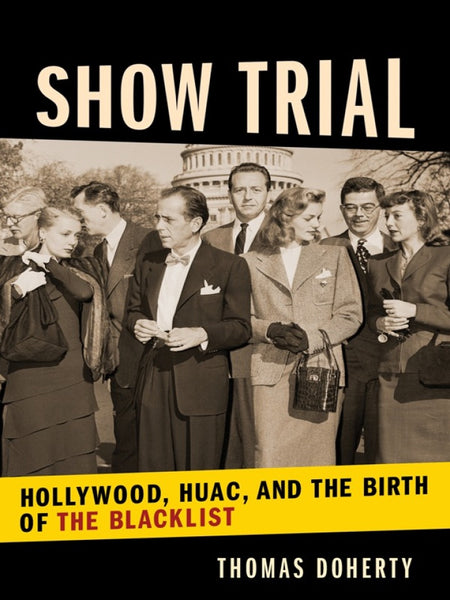 At the center of the cover is an uncolored photograph (which spans the width of the cover, but not the height) of 8 people standing in front of the Capitol building, under the title "Show Trial." Beneath the picture is a strip of yellow, against which the subtitle "Hollywood, HUAC, and the Birth of the Blacklist" is written in block lettering. Below this is another strip of black on which the author's name is written.